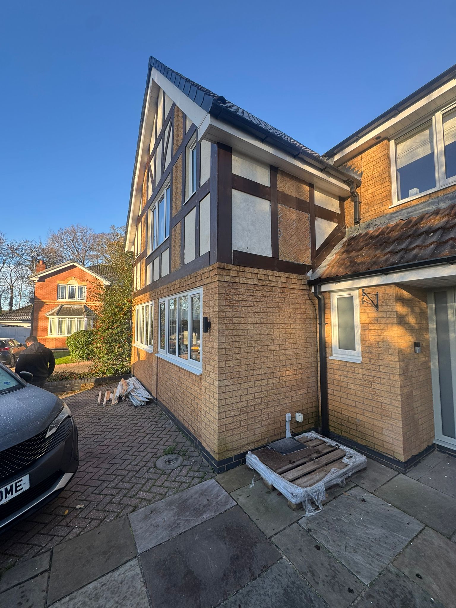 House before rendering - front view showing worn brickwork in Leeds